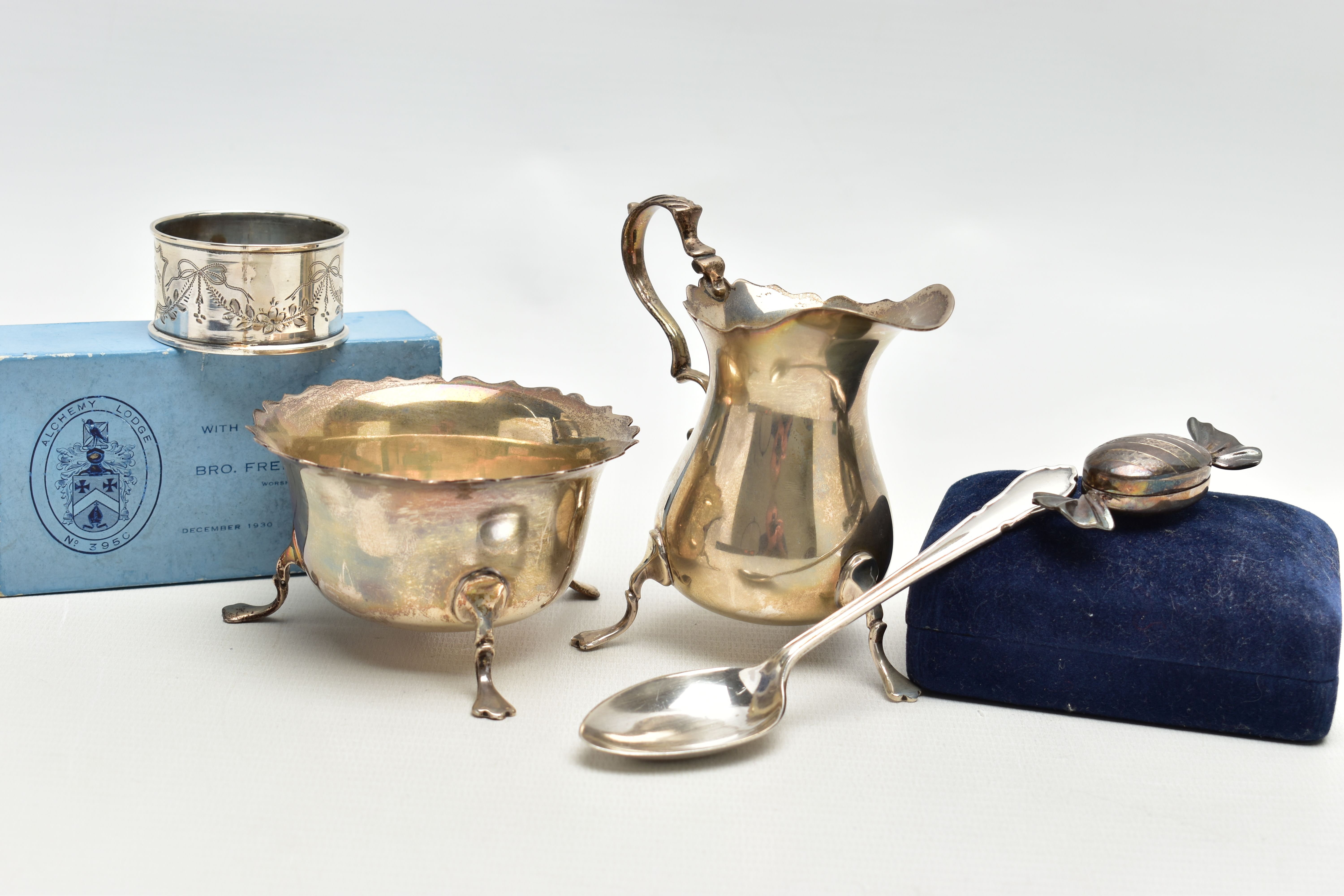 AN ELIZABETH II SILVER CREAM JUG AND SUGAR BOWL AND THREE OTHER ITEMS OF SILVER, the baluster shaped
