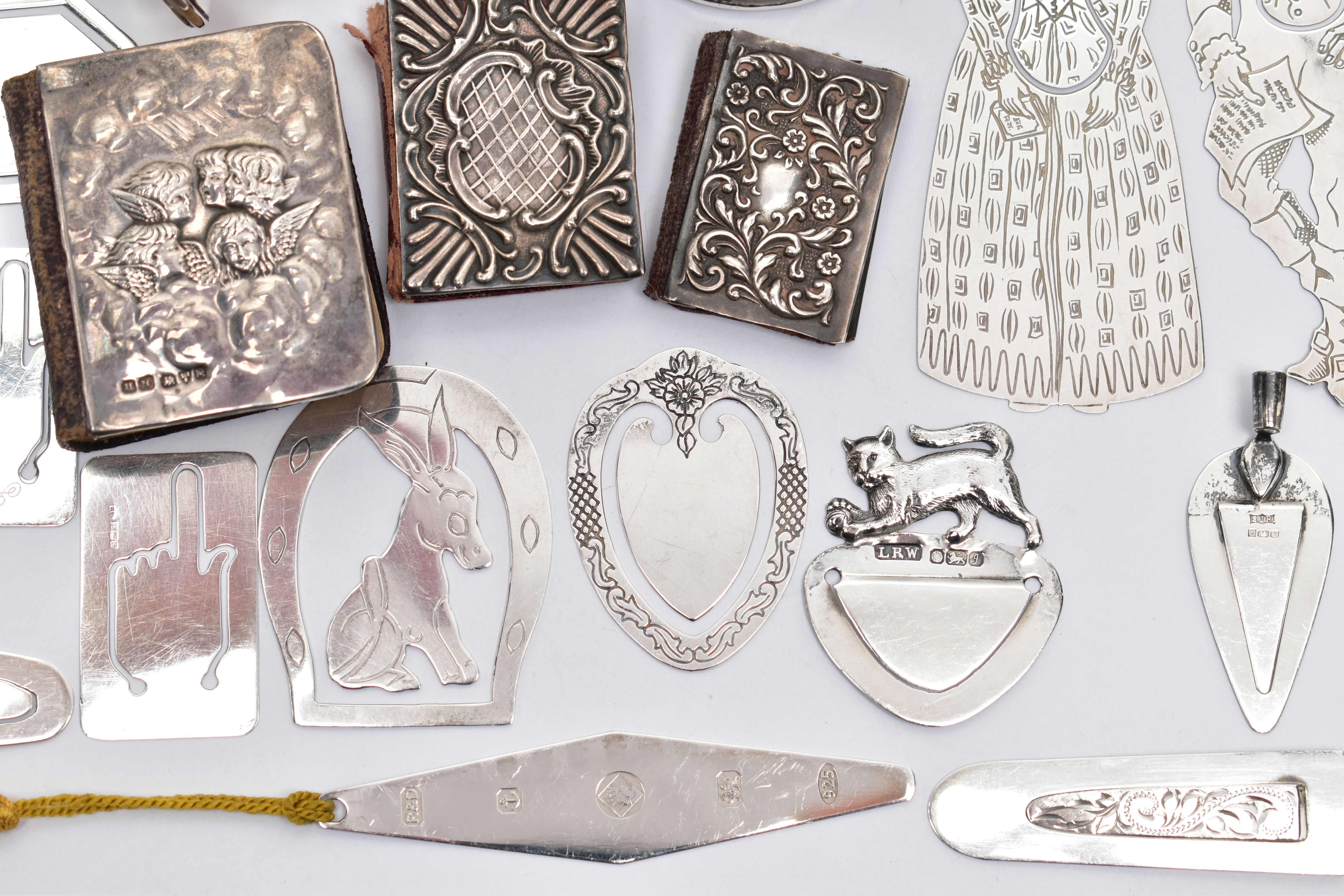 A PARCEL OF SILVER BOOK MARKS, SILVER COVERED NEEDLECASES, ETC, comprising a miniature book of - Image 4 of 9