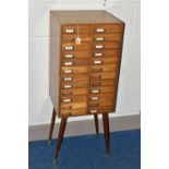 OPTOMETRIST INTEREST: A 1960'S /70'S TEAK CHEST OF TWENTY-FOUR SHORT DRAWERS, each drawer with