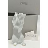 A LALIQUE FIGURE OF A PLAYFUL CAT SITTING BACK ON ITS HIND LEGS, possibly known as Laughing Cat,