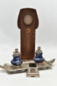AN ARTS AND CRATFS COPPER MANTEL CLOCK, the shaped rectangular case embossed with planished style
