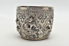 A LATE 19TH / EARLY 20TH CENTURY INDIAN SILVER BOWL, the exterior cast in relief with figures