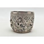 A LATE 19TH / EARLY 20TH CENTURY INDIAN SILVER BOWL, the exterior cast in relief with figures