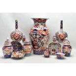 A GROUP OF LATE 19TH AND EARLY 20TH CENTURY JAPANESE IMARI PORCELAIN, the majority with damage and