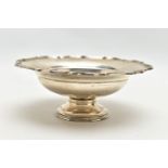 A GEORGE V SILVER PEDESTAL bowl, with pie crust rim, dished centre, on a short pedestal with stepped