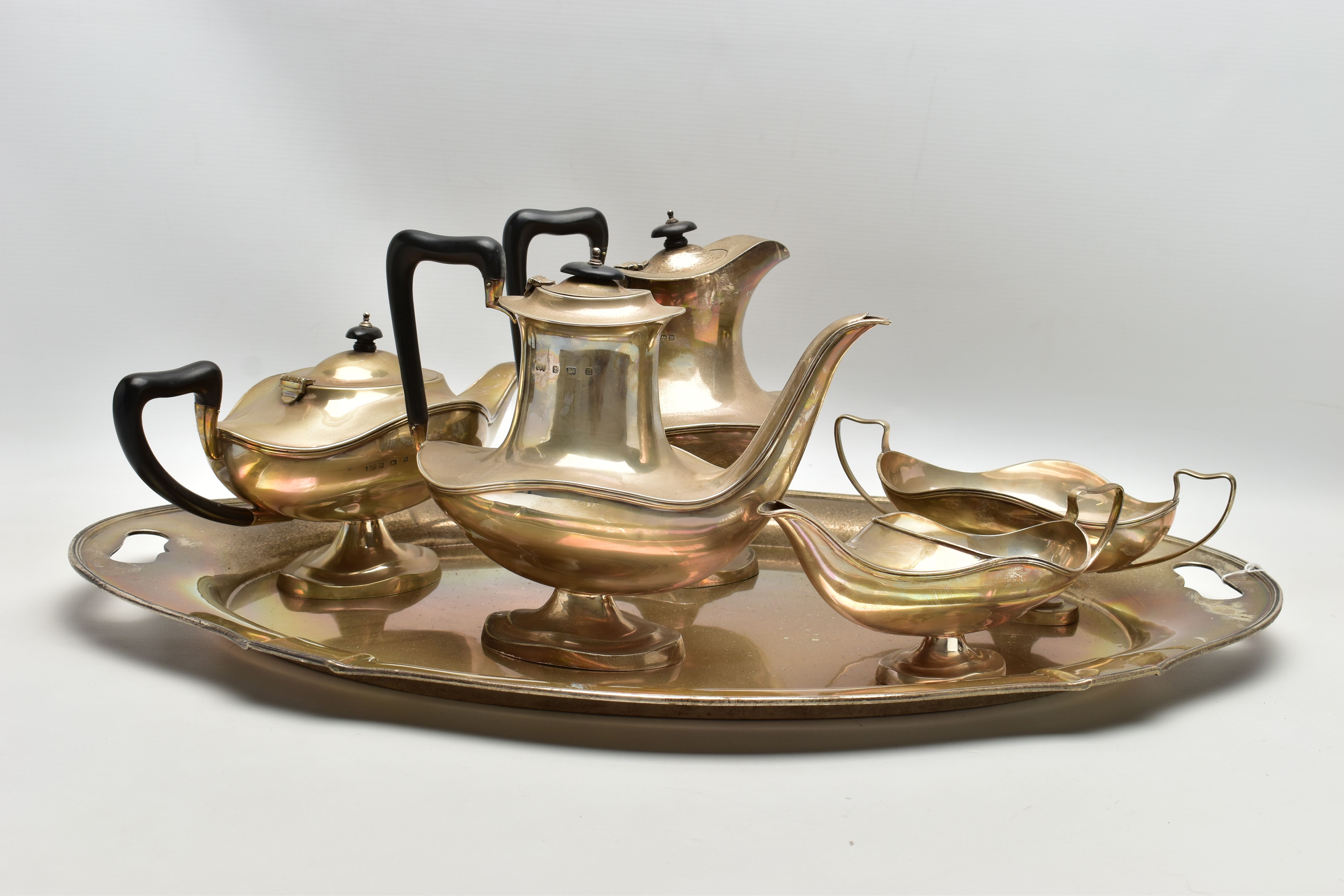 A GEORGE V SILVER FIVE PIECE TEA SET ON OVAL TWIN HANDLED TRAY, the set of oval / Aladdin's lamp - Image 4 of 8