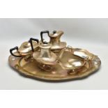 A GEORGE V SILVER FIVE PIECE TEA SET ON OVAL TWIN HANDLED TRAY, the set of oval / Aladdin's lamp