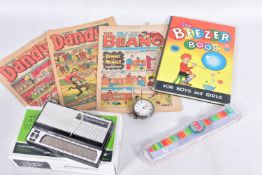 A TRAY OF COMICS, WATCHES AND A STYLOPHONE, featuring a Beano comic, no. 1948 Nov 17th 1979, and two