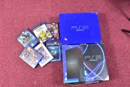 TWO BOXED PLAYSTATION 2 CONSOLES AND A QUANTITY OF GAMES, one of the consoles was not the one that