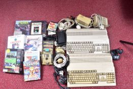 TWO AMIGA A-500 COMPUTERS, GAMES AND ACCESSORIES, acessories include mice and joysticks, games