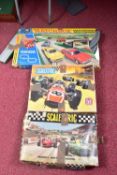 TWO DISTRESSED SCALEXTRIC RACING SETS AND A MATCHBOX MOTORISED MOTORWAY BOXED SET, boxes are in poor