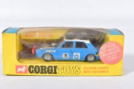 A BOXED CORGI TOYS HILLMAN HUNTER RALLY CAR, No.302, with Golden Jacks wheels, complete with