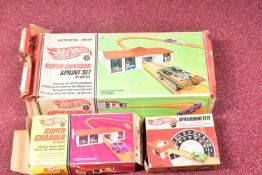 THREE VINTAGE BOXED MATTEL HOTWHEELS SETS, all boxes distressed, to include a 'Super-Charger' with a