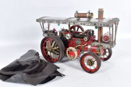 A BATTERY POWERED BUILT MECANO SHOWMANS STEAM ENGINE, with battery powered motor to control lighting