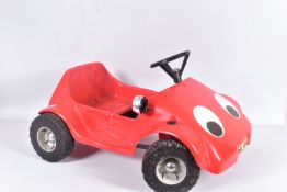 A 1970'S RALEIGH CHILDS PEDAL CAR, red plastic body on metal chassis with plastic wheels and