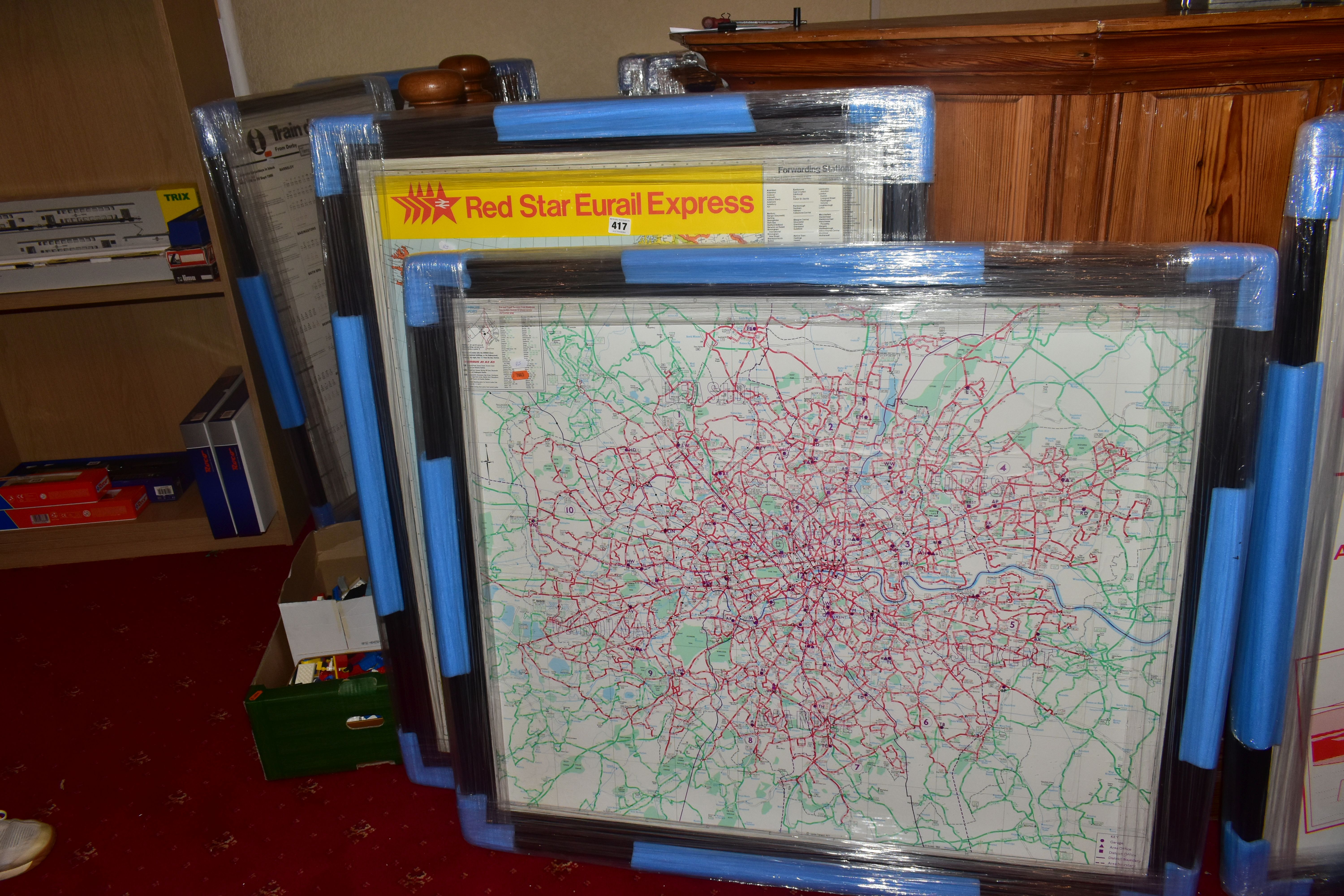 A FRAMED AND GLAZED LONDON TRANSPORT BUS MAP, from the 1980's, with a framed and glazed Red Star