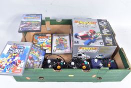 A BOXED NINTENDO GAMECUBE, GAMES, CONTROLLERS AND MEMORY CARD, games include Super Mario Sunshine,