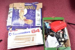 A BOXED COMMODORE 64 (C64 MODEL), ACCESSORIES AND A QUANTITY OF GAMES, accessories include a