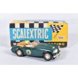 A BOXED SCALEXTRIC AUSTIN HEALEY 3000, No.C/74, green body with beige interior, complete with