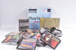 BOXED PLAYSTATION, UNBOXED PLAYSTATION, CONTROLLERS, TWO MEMORY CARDS AND A QUANTITY OF GAMES,