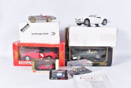 A BOXED DANBURY MINT 1949 JAGUAR XK120, 1/24 scale, missing mirrors and has some yellowing to