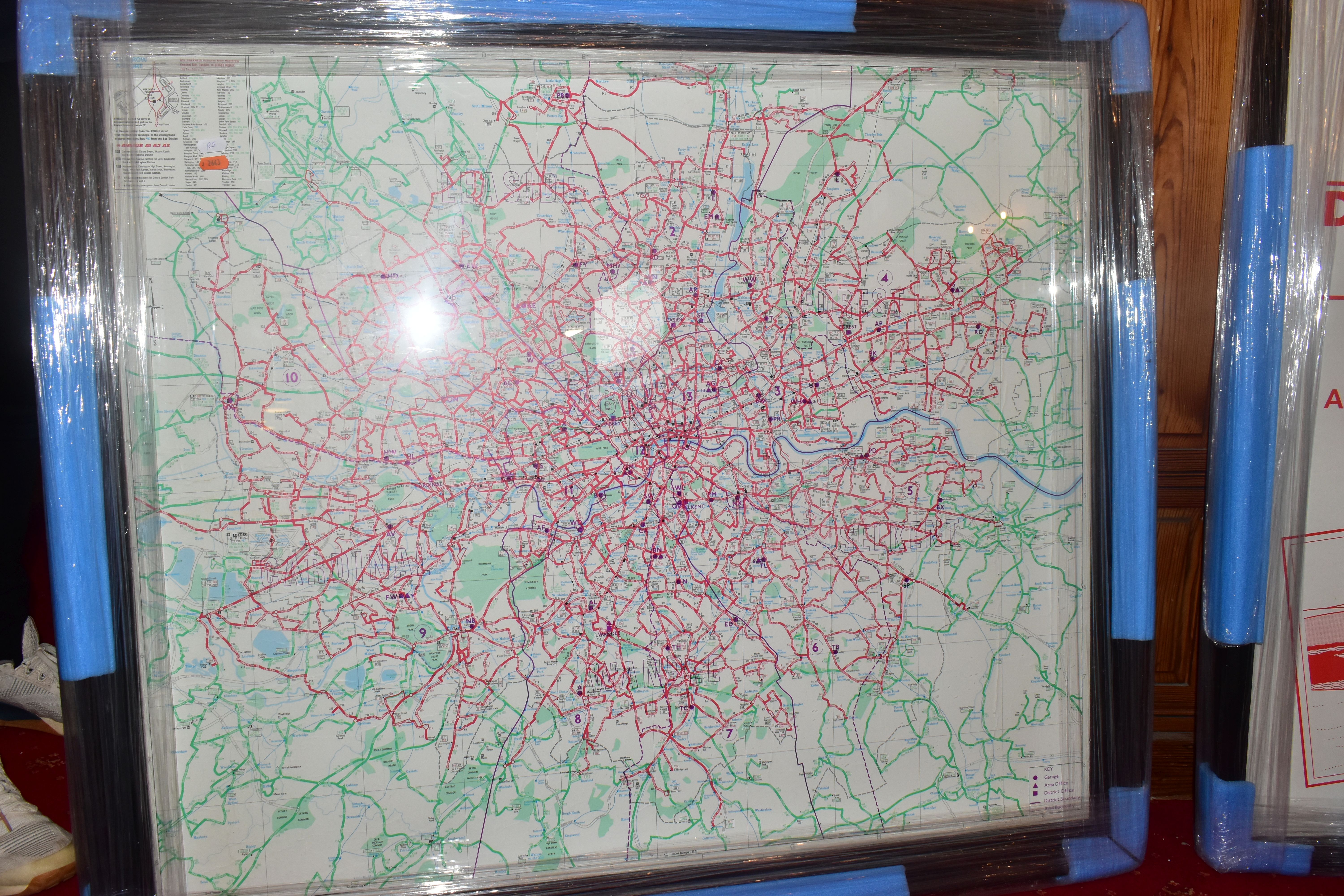 A FRAMED AND GLAZED LONDON TRANSPORT BUS MAP, from the 1980's, with a framed and glazed Red Star - Image 2 of 3