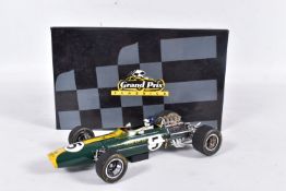 A BOXED EXOTO 1/18 SCALE GRAND PRIX CLASSICS LOTUS FORD TYPE 49, green with RN5, appears complete