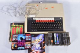 A BBC MICROCOMPUTER, MICROCOMPUTER USER GUIDE & A QUANTITY OF GAMES, games include Elite, 3D Bomb