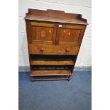 A 20TH CENTURY OAK CABINET, with a raised back, two cupboard doors and a long drawer, with a lower