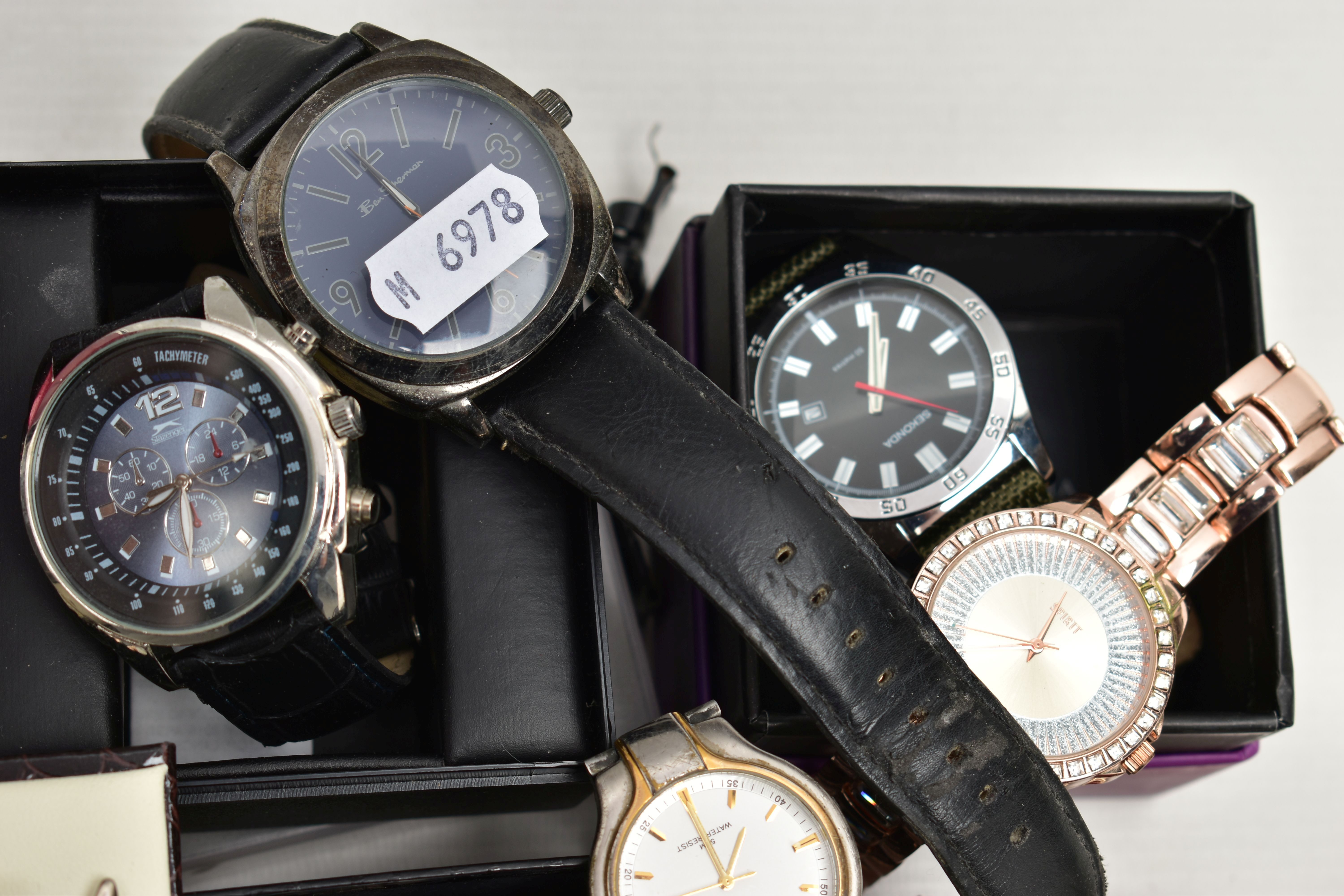 A BOX OF ASSORTED WRISTWATCHES, thirteen wrist watches, names to include 'Ben Sherman, Caribbean - Image 5 of 5