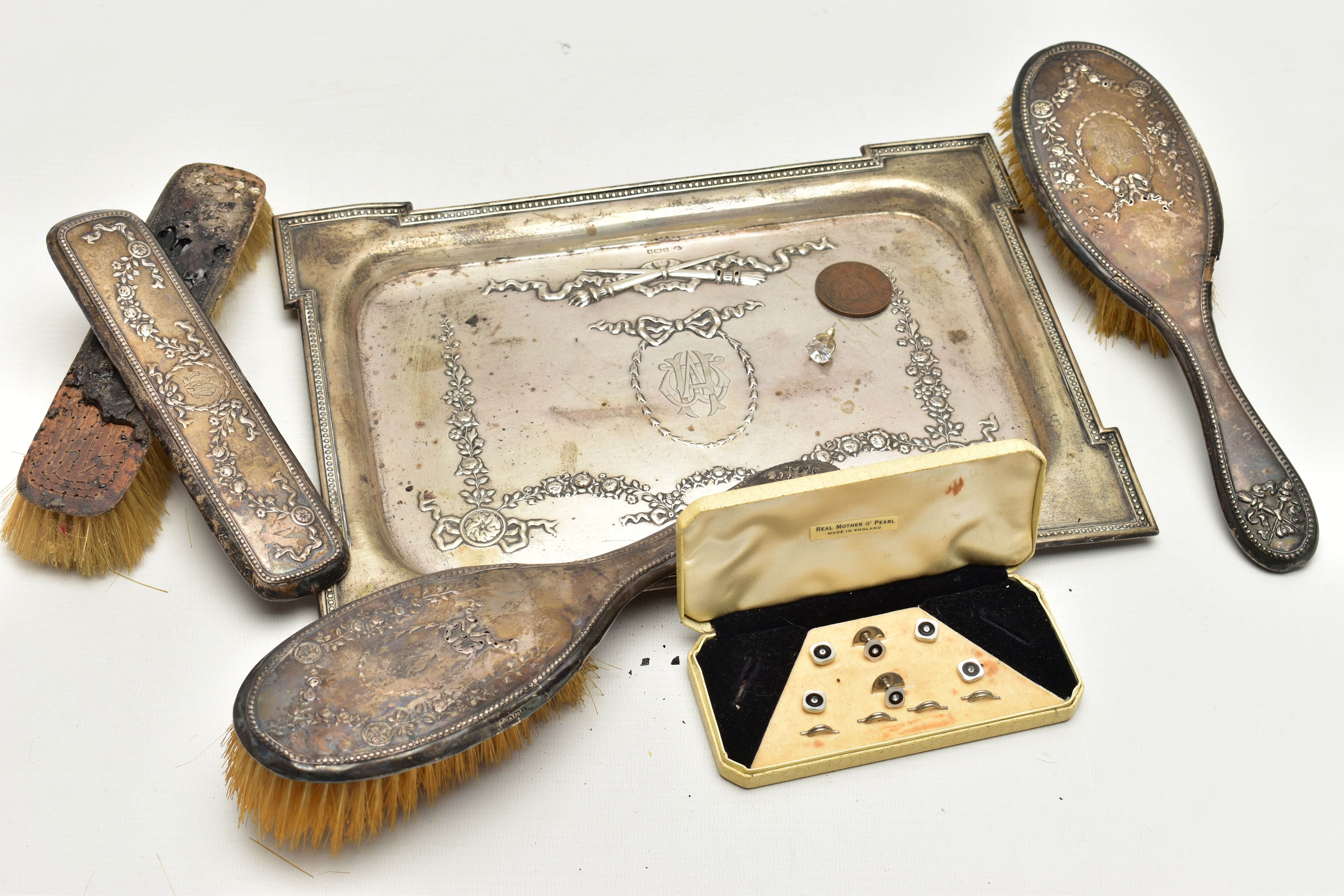 AN EARLY 20TH CENTURY SILVER TRAY AND VANITY PIECES, the tray of a rectangular form, decorated