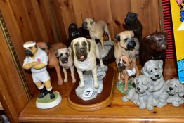 A COLLECTION OF BULL MASTIFF DOG FIGURINES, comprising a bronzed effect figure of a girl reading