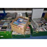 CDS, eight boxes and one case containing a collection of over 1100 miscellaneous compact discs,