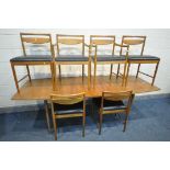 A MID CENTURY MCINTOSH TEAK EXTENDING DINING TABLE, with two fold out leaves, on tapered legs,