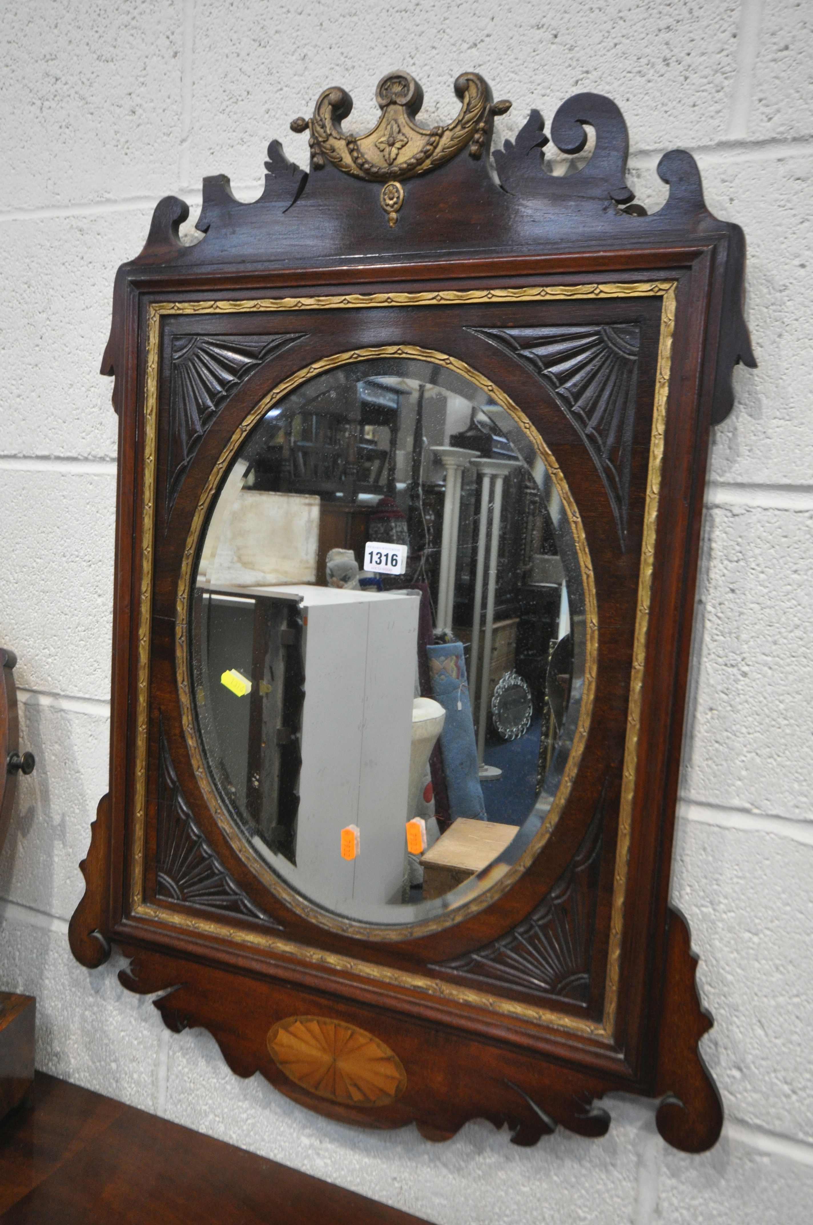 AN EARLY 19TH CENTURY MAHOGANY AND GILT FRETWORK FRAMED WALL MIRROR, with an oval bevelled plate, - Image 2 of 4