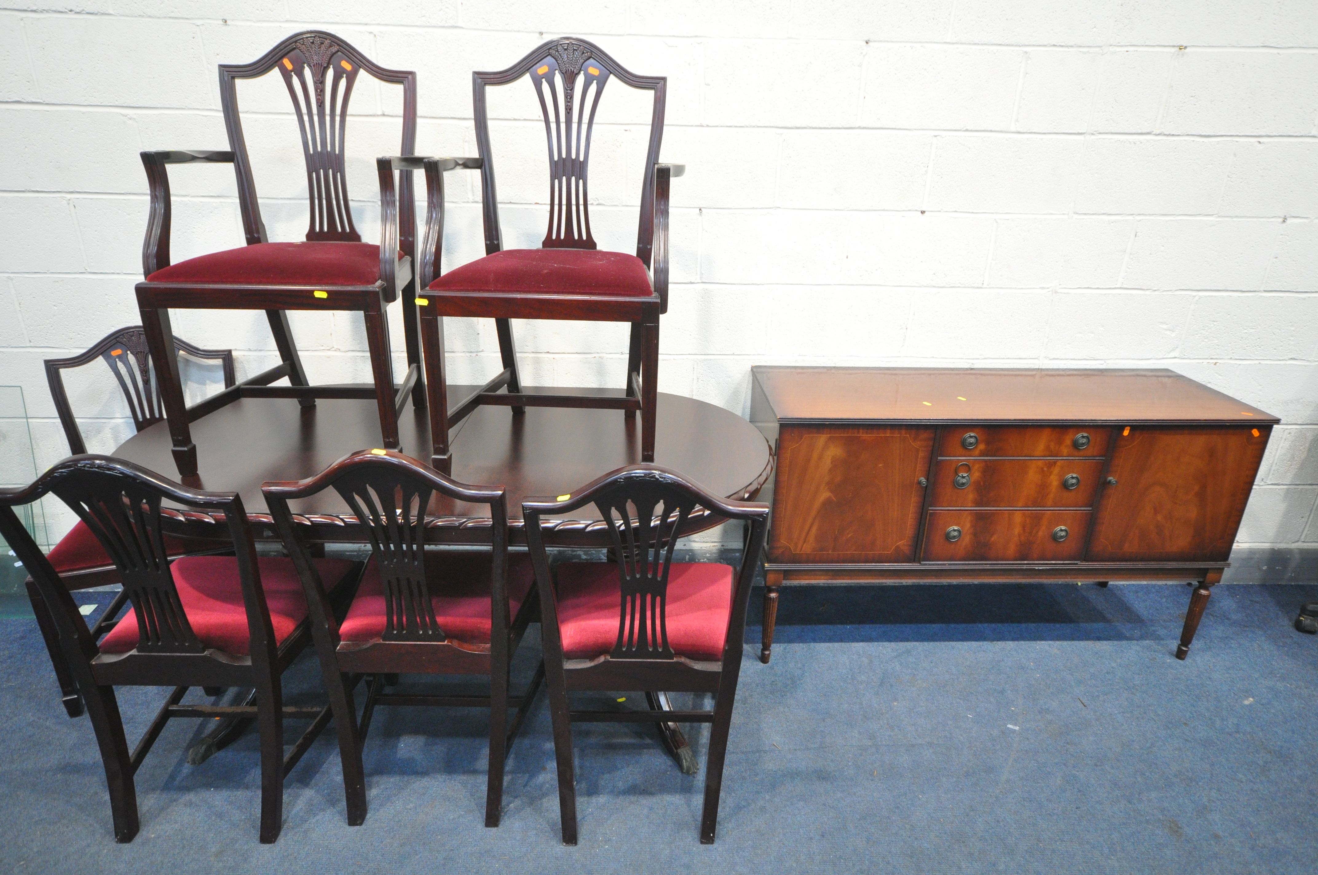 A MAHOGANY EXTENDING DINING TABLE, with a single fold out leaf, length 165cm x 91cm x height 78cm,