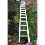 AN ALUMINIUM DOUBLE EXTENSION LADDER with 15 rungs to each 400cm section