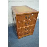 A YEW WOOD TWO DRAWER FILING CABINET, with a tan leather and inlaid writing surface, width 48cmx
