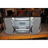 A SHARP CD-DP2400 MIDI HI FI with matching speakers (PAT pass and working)