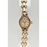 A LADIES 9CT GOLD 'EVERITE' WRISTWATCH, manual wind, gold dial signed 'Everite, 21 jewels', baton