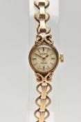 A LADIES 9CT GOLD 'EVERITE' WRISTWATCH, manual wind, gold dial signed 'Everite, 21 jewels', baton
