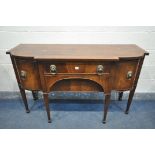 A GEORGIAN STYLE MAHOGANY SIDEBOARD, with double cupboard doors that's flanking two drawers, on
