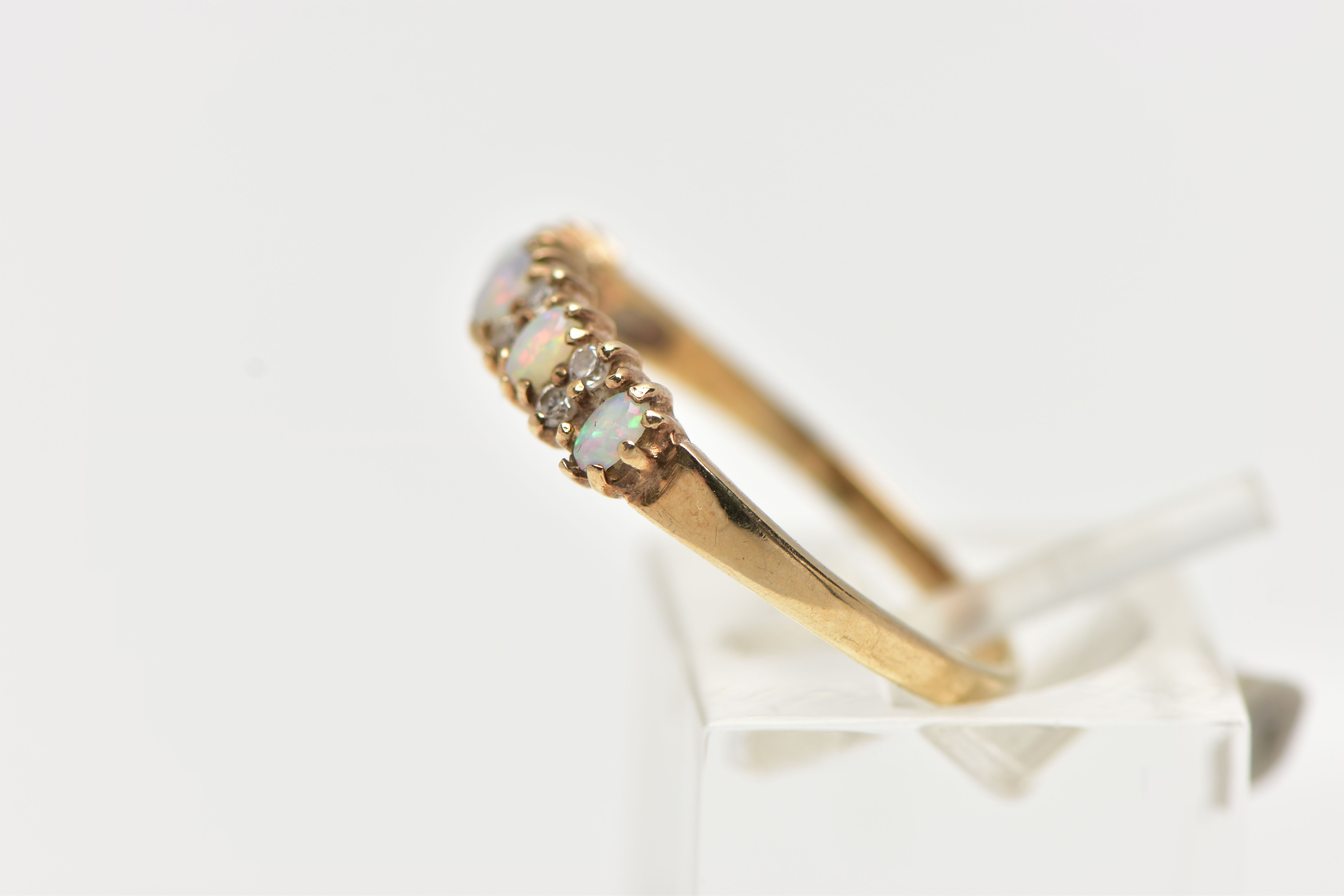 A 9CT GOLD OPAL AND DIAMOND HALF ETERNITY RING, designed with five oval cut opal cabochons, each - Image 2 of 4