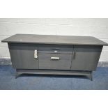 A MODERN GREY PAINTED LOW SIDEBOARD, with two sized drawers, flanked by two cupboard doors, length