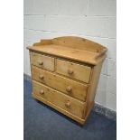 A VICTORIAN PINE WASHSTAND/CHEST OF FOUR DRAWERS, with turned handles and feet, width 91cm x depth