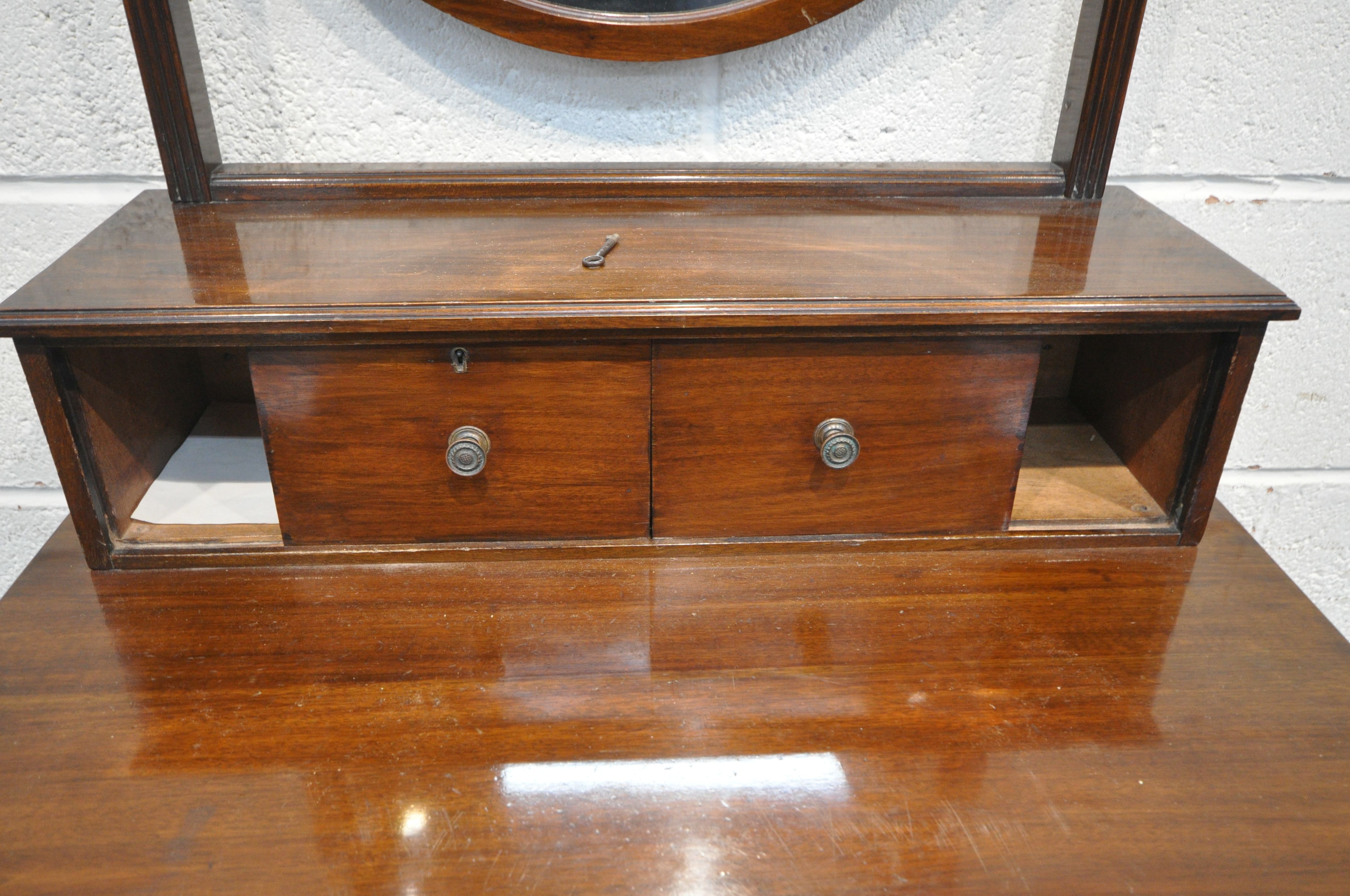 AN EDWARDIAN MAHOGANY BOW FRONT DRESSING CABINET, with a single circular bevelled mirror, two - Image 3 of 6