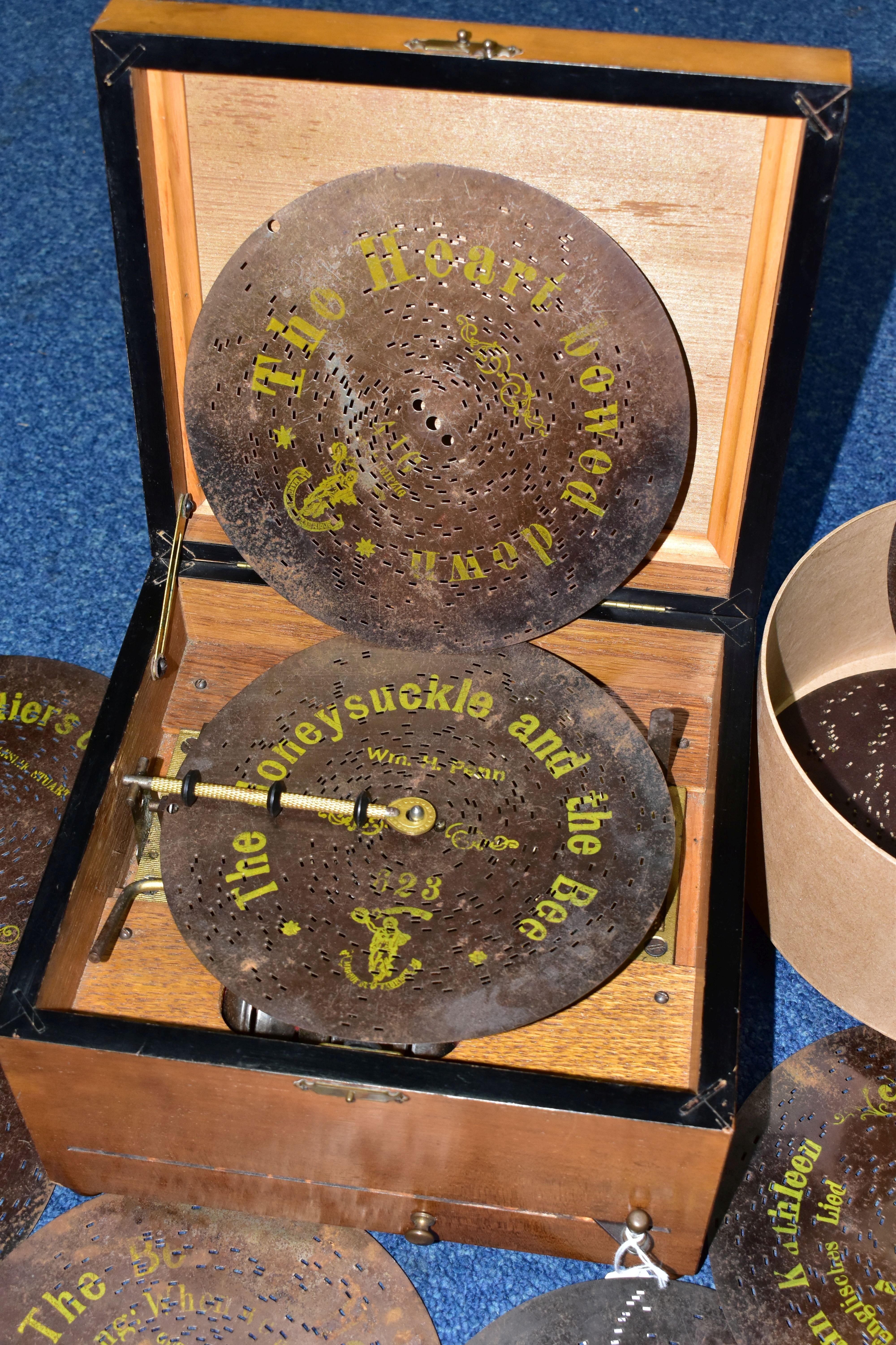 AN EARLY 20TH CENTURY POLYPHON, fitted with six bells, complete with twelve 8 discs - Image 2 of 8