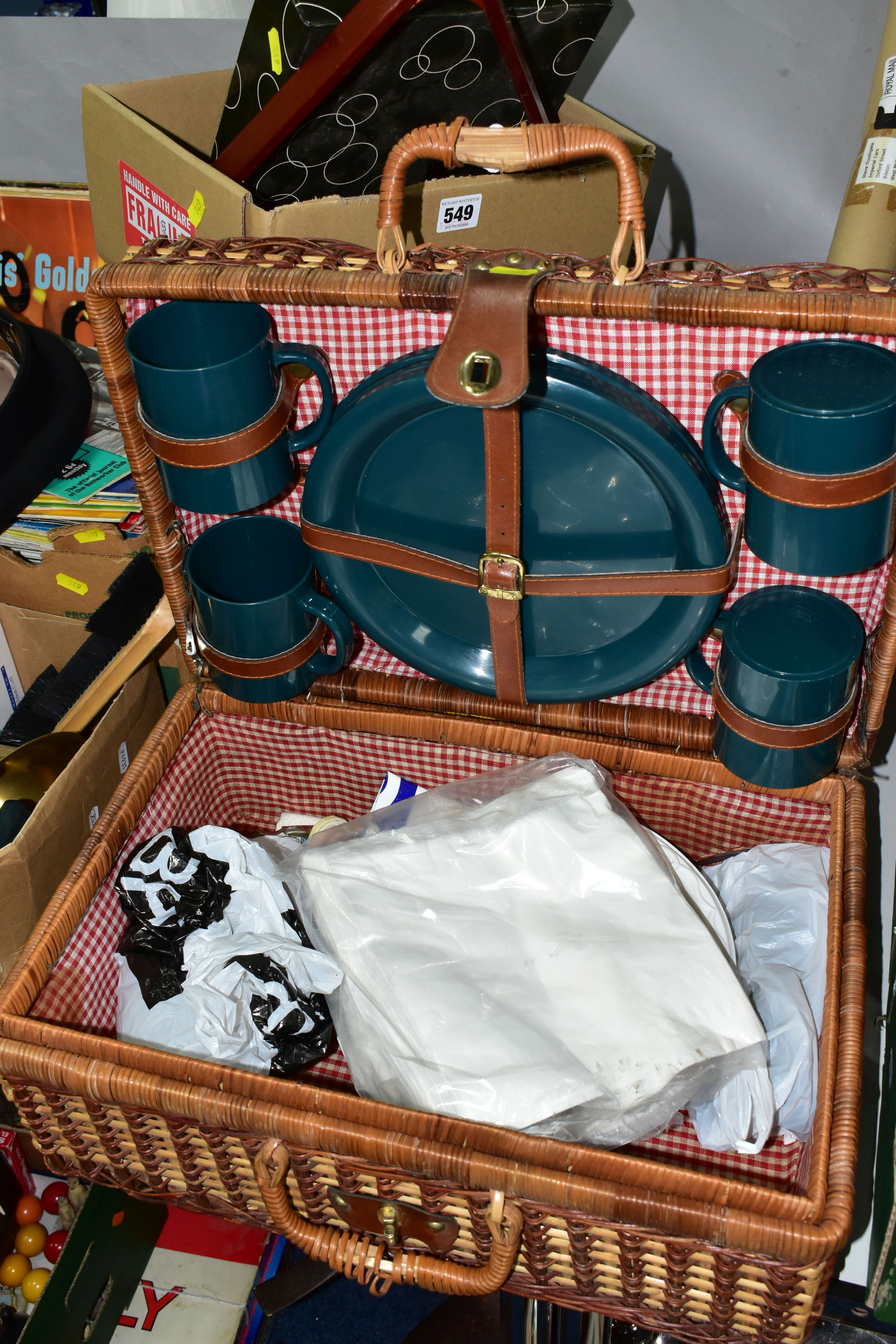 FOUR BOXES OF SUNDRIES AND ONE PICNIC BASKET, to include a black Breton cap, a large brass vintage - Image 8 of 8