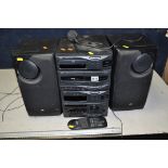 A JVC MX-56 HI FI SYSTEM with two matching speakers and remote (one motorised speaker inoperable,