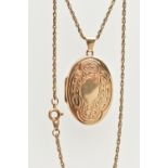 A 9CT GOLD LOCKET AND CHAIN, the locket of an oval form, decorated with a foliate pattern and vacant